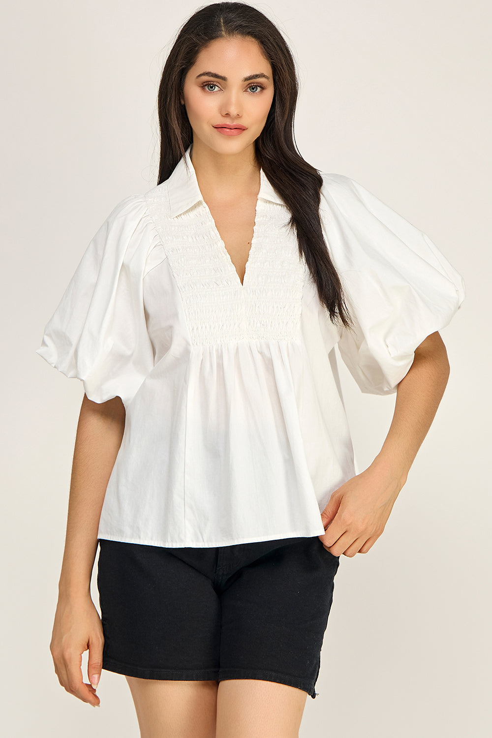Smocked V Neck Flutter Sleeve Peplum Blouse