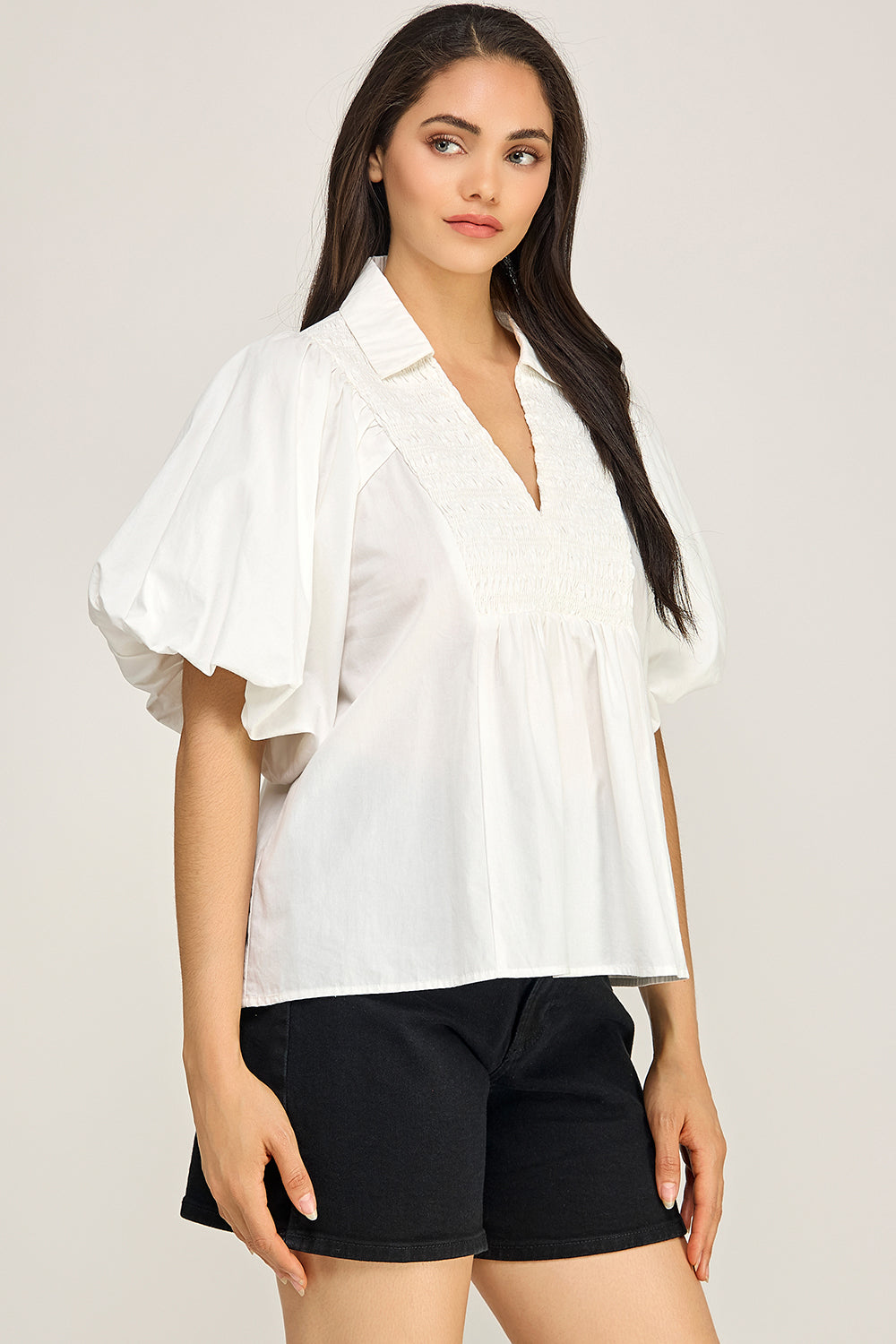 Smocked V Neck Flutter Sleeve Peplum Blouse